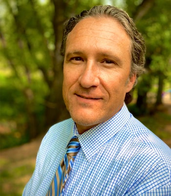 Portrait of Greg Ashby, Broker Associate.